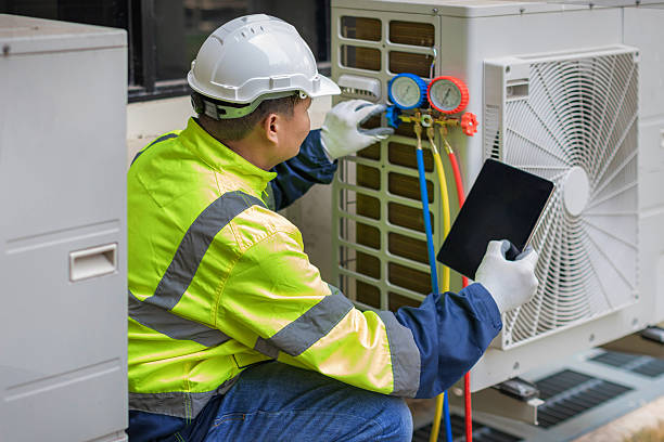 Professional Heat Pump Repair technician working in Trinity, FL
